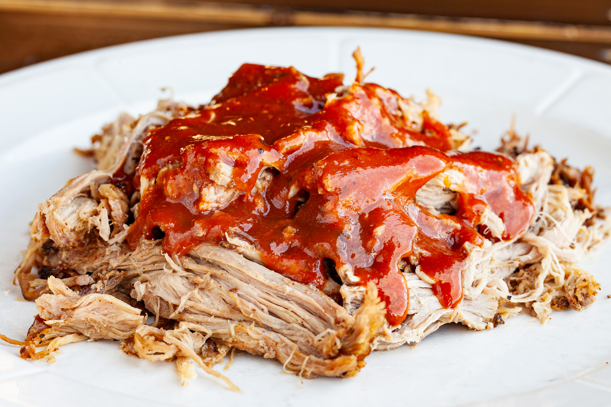 Prairie Dog Brewing Pulled Pork with red BBQ sauce on top