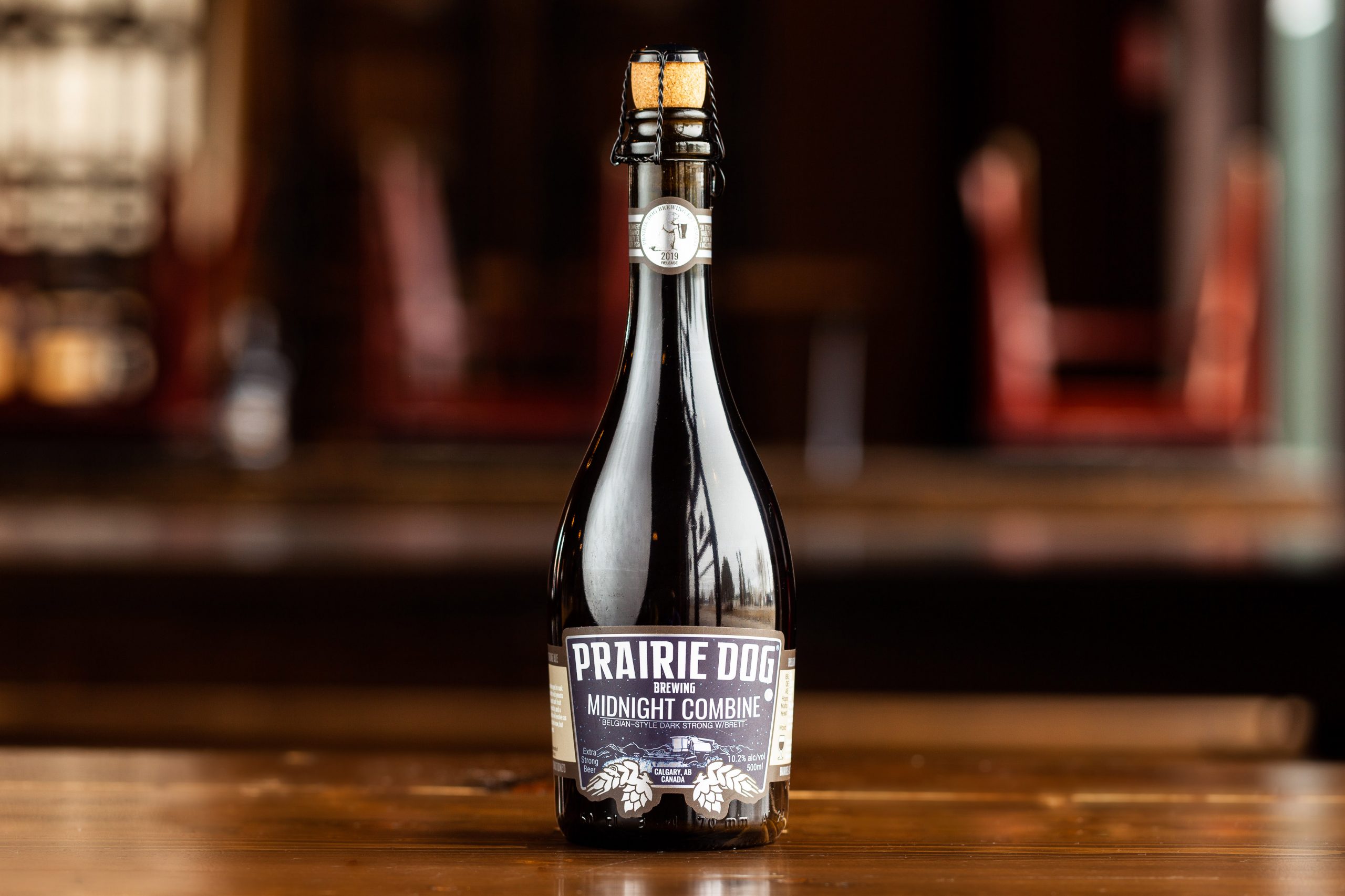 A 500-ml bottle of Midnight Combine, Prairie Dog's premier Belgian-style barrel-aged dark strong ale, brewed with a mixed fermentation of microorganisms.