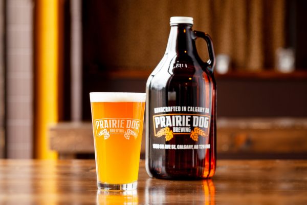 A 64-oz growler jug of our hazy American-style wheat beer, Super B.