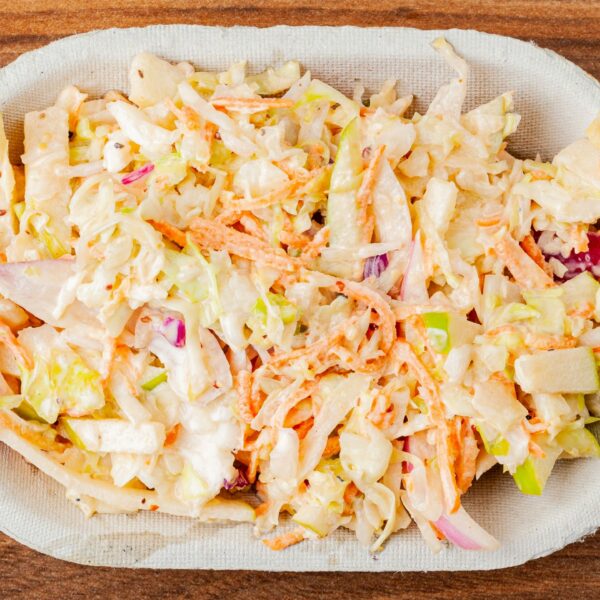 Prairie Dog Brewing's house coleslaw with apples, cabbage, carrot and red onion in a zesty dressing.