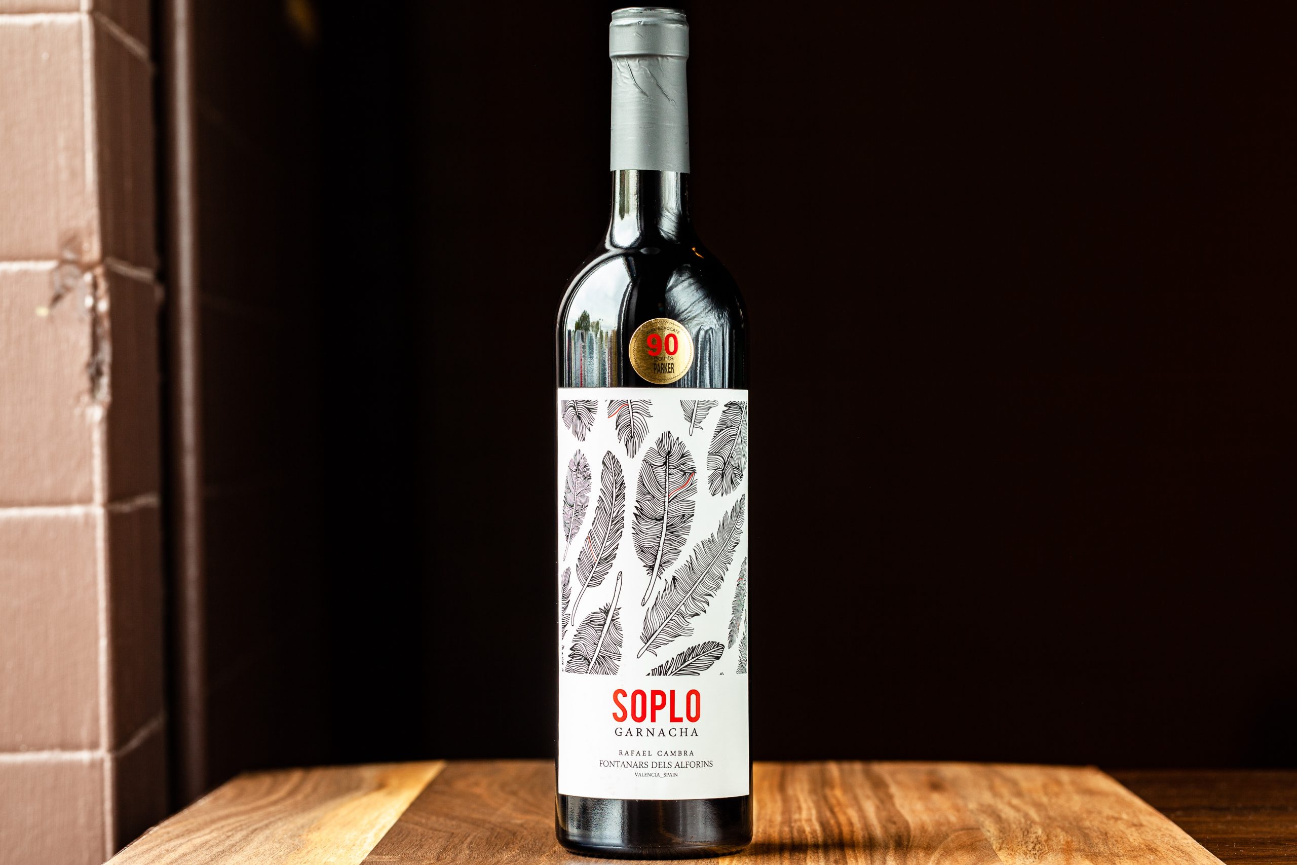 A 750-mL bottle of Rafael Cambra Soplo Grenacha red wine.