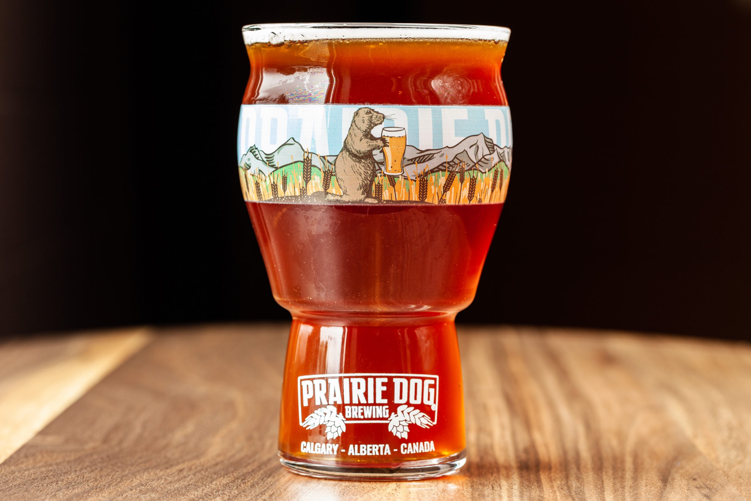 A 16-oz glass of Prairie Dog Brewing's Prairie Lands Vienna Lager.