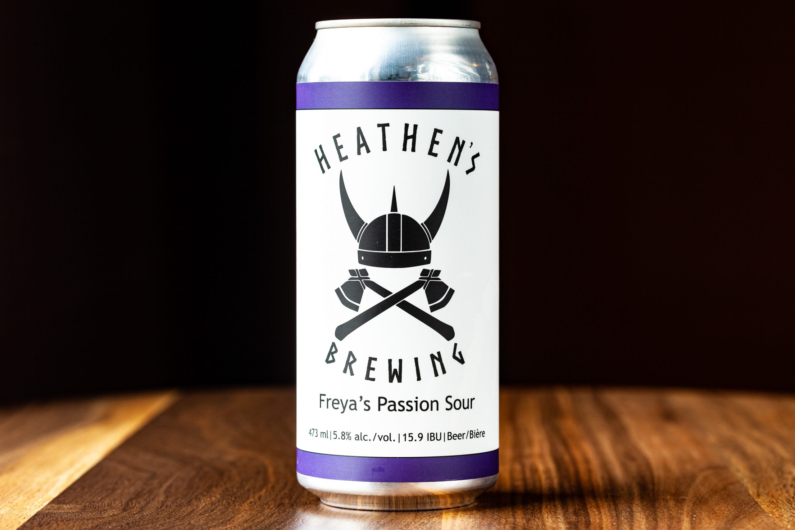 A 473-mL can of Heathen's Brewing Freya's Passion Sour gluten free beer.