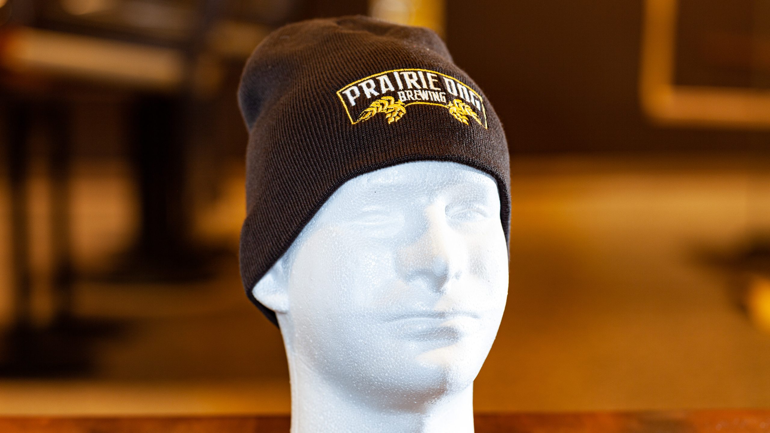 Prairie Dog Brewing's basic brown beanie-style toque with embroidered logo.