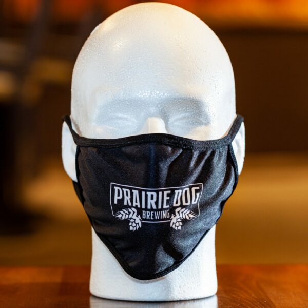 A branded Prairie Dog Brewing reusable cloth face mask, in black colour.