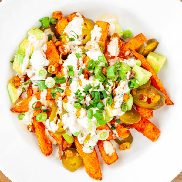 A bowl of loaded sweet potato fries from Prairie Dog Brewing's seasonal Baja menu.