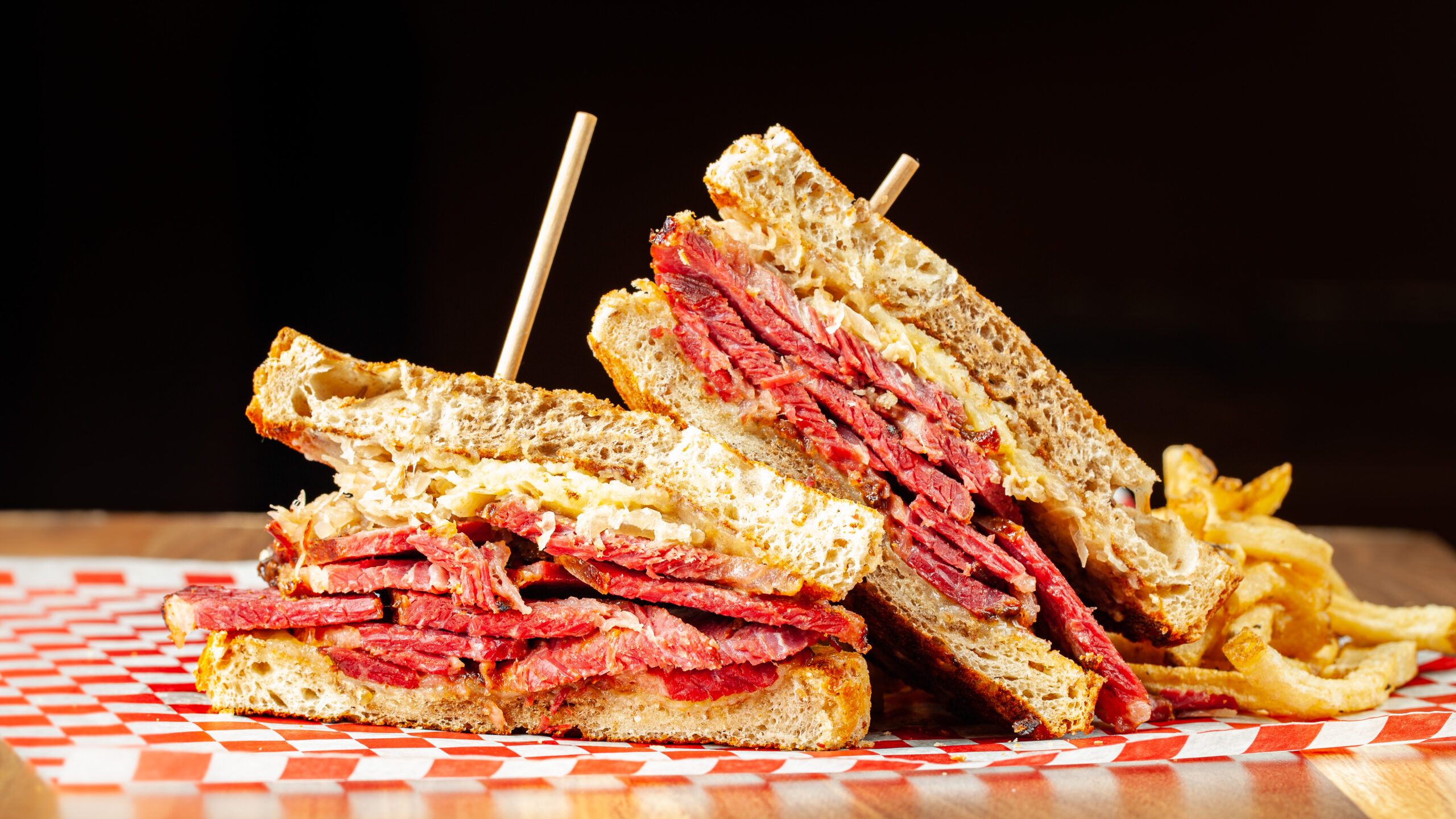 Prairie Dog Brewing's Pastrami on Rye Sandwich with side fries.