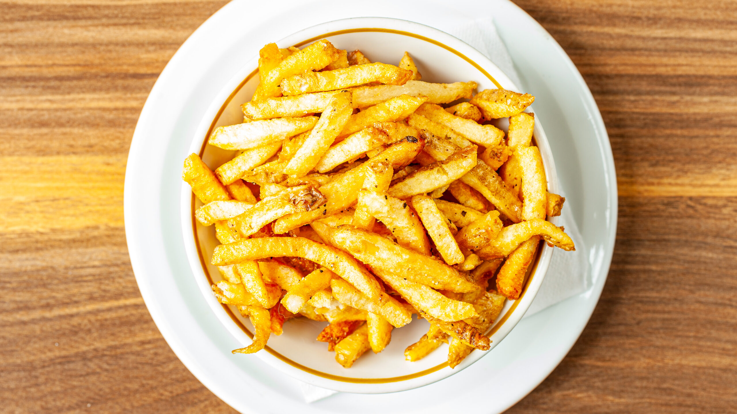 Prairie Dog Brewing's house-cut Kennebec potato french fries in a side bowl.