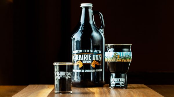 Prairie Dog Brewing Wholly Mole Mexican-inspired chocolate chili pepper stout in three draft options - 5oz or 16oz pours, or growler jug fills.