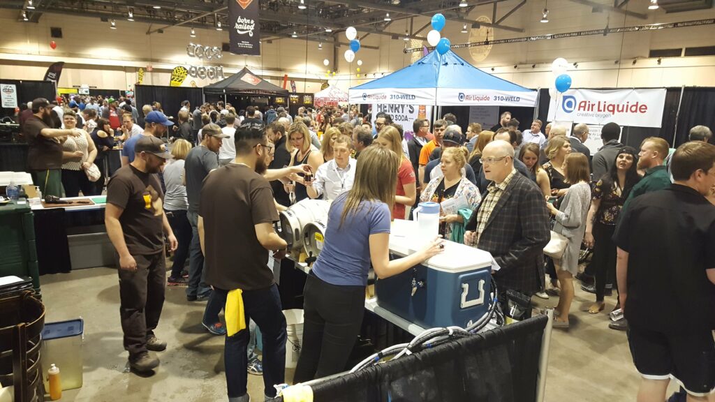 The Prairie Dog Brewing team serves up delicious barbecue and craft beer at the Calgary International Beerfest in May, 2018.