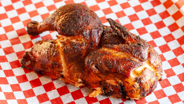 Prairie Dog Brewing barbecued chicken half on a platter.