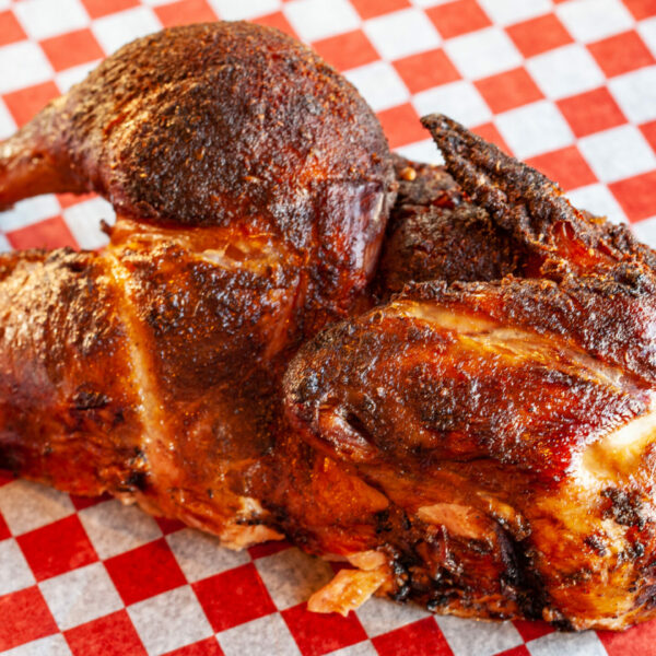 Prairie Dog Brewing barbecued chicken half on a platter.