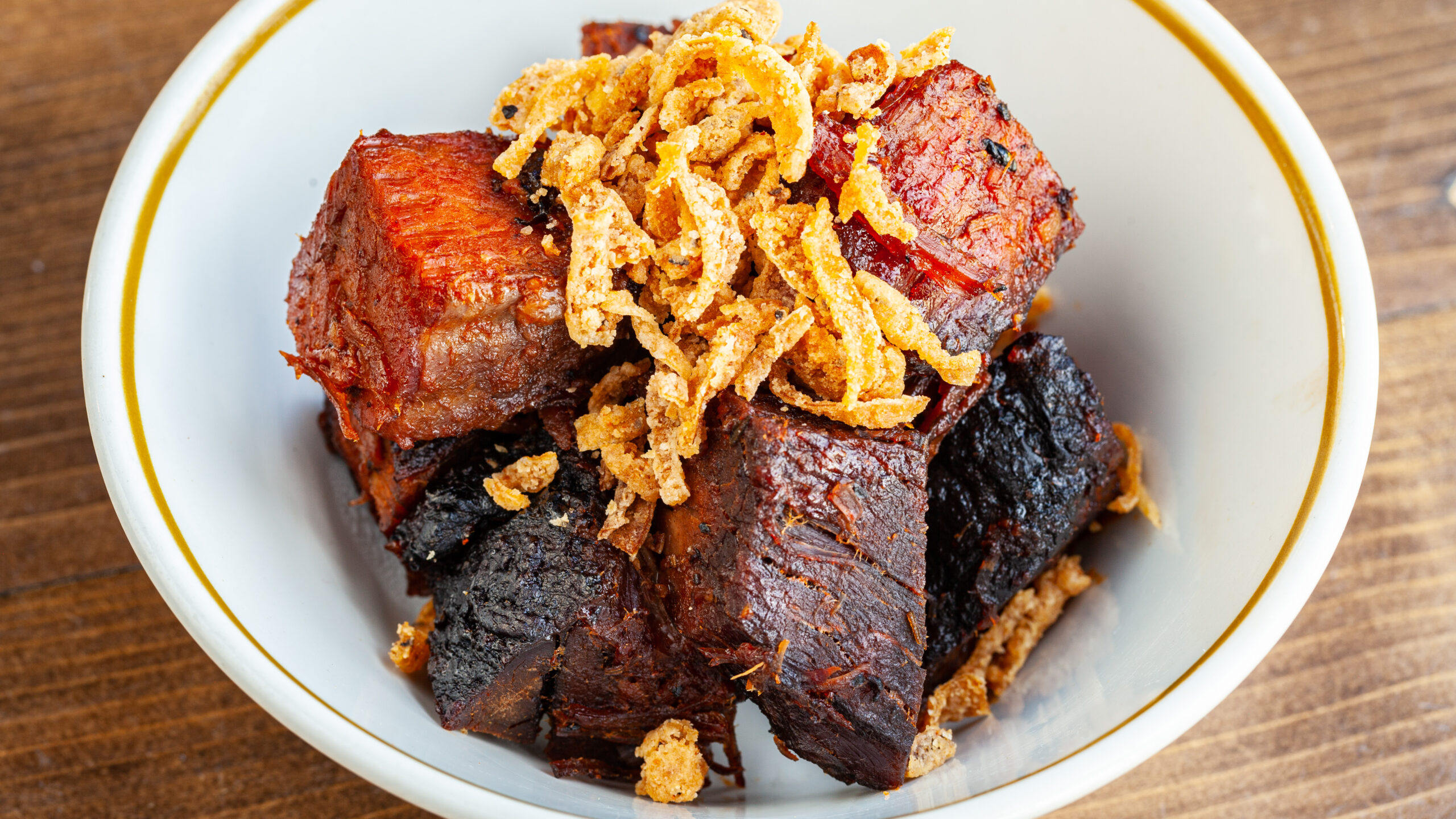 Prairie Dog Brewing's signature smoked brisket burnt ends with a dusting of fried onions.