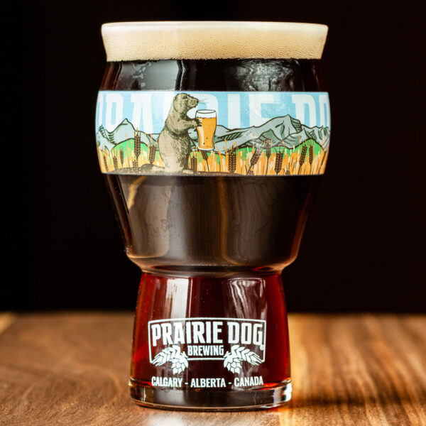 A 16-oz glass of Prairie Dog Brewing Gunnison's Red ale.