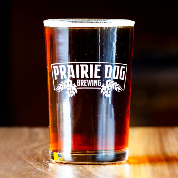 A 150mL draft pour of Prairie Dog Brewing's Gunnison's Red Ale.