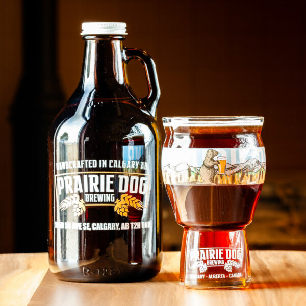 A 946mL howler jug and 473mL draft pour of Prairie Dog Brewing's Coconut Brown Ale