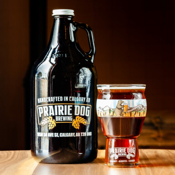 A 1.89L growler jug and 473mL draft pour of Prairie Dog Brewing's Coconut Brown Ale