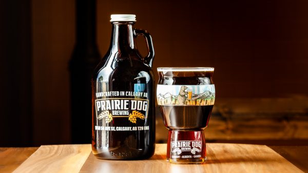 A 946mL howler jug and 473mL draft pour of Prairie Dog Brewing's Gunnison's Red Ale.