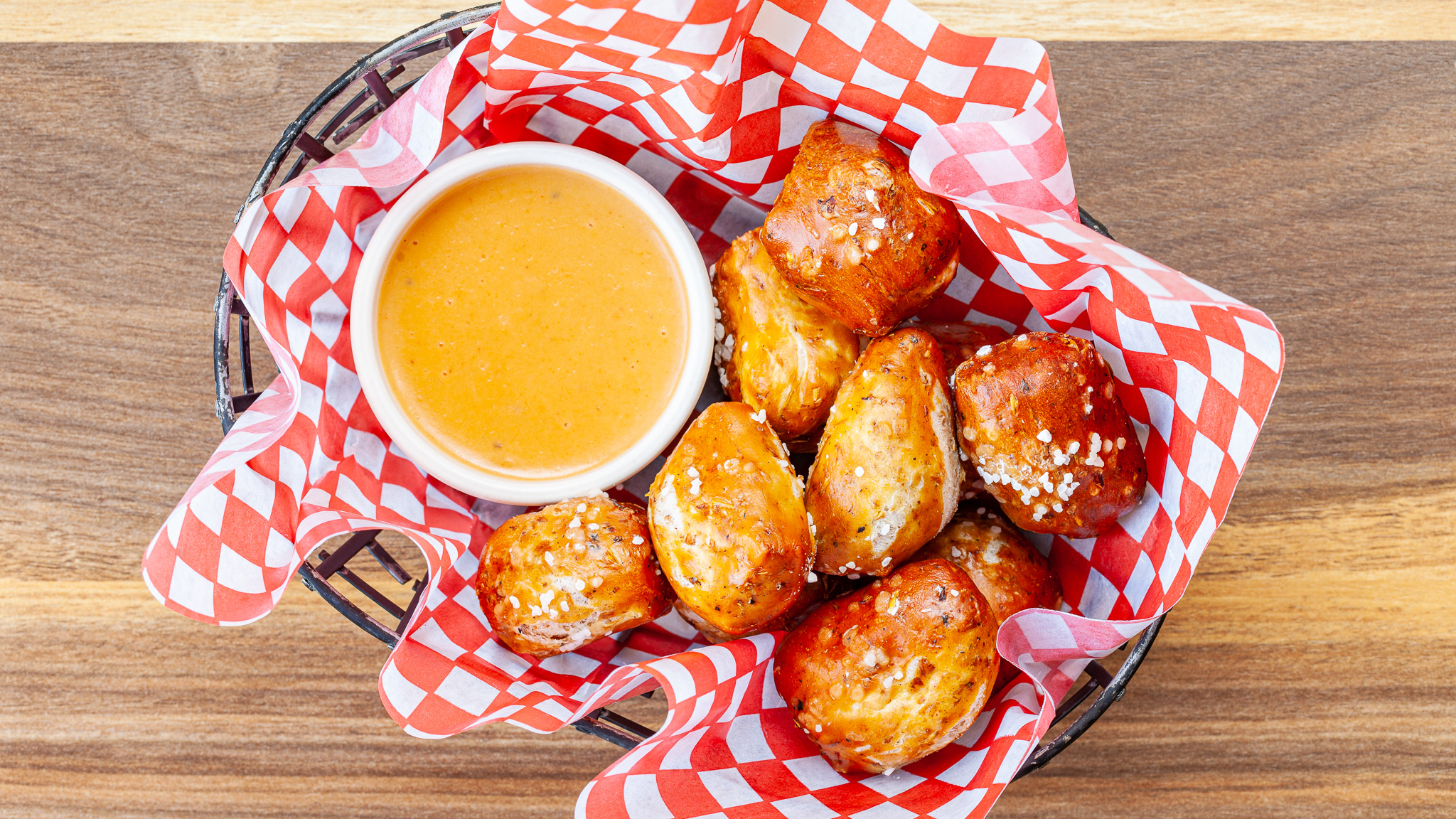 Prairie Dog Brewing's Pretzel Bites appetizer dish, with SkyeFire Bakery pretzels made with spent grains from our brewery, and our house-made cheese sauce.