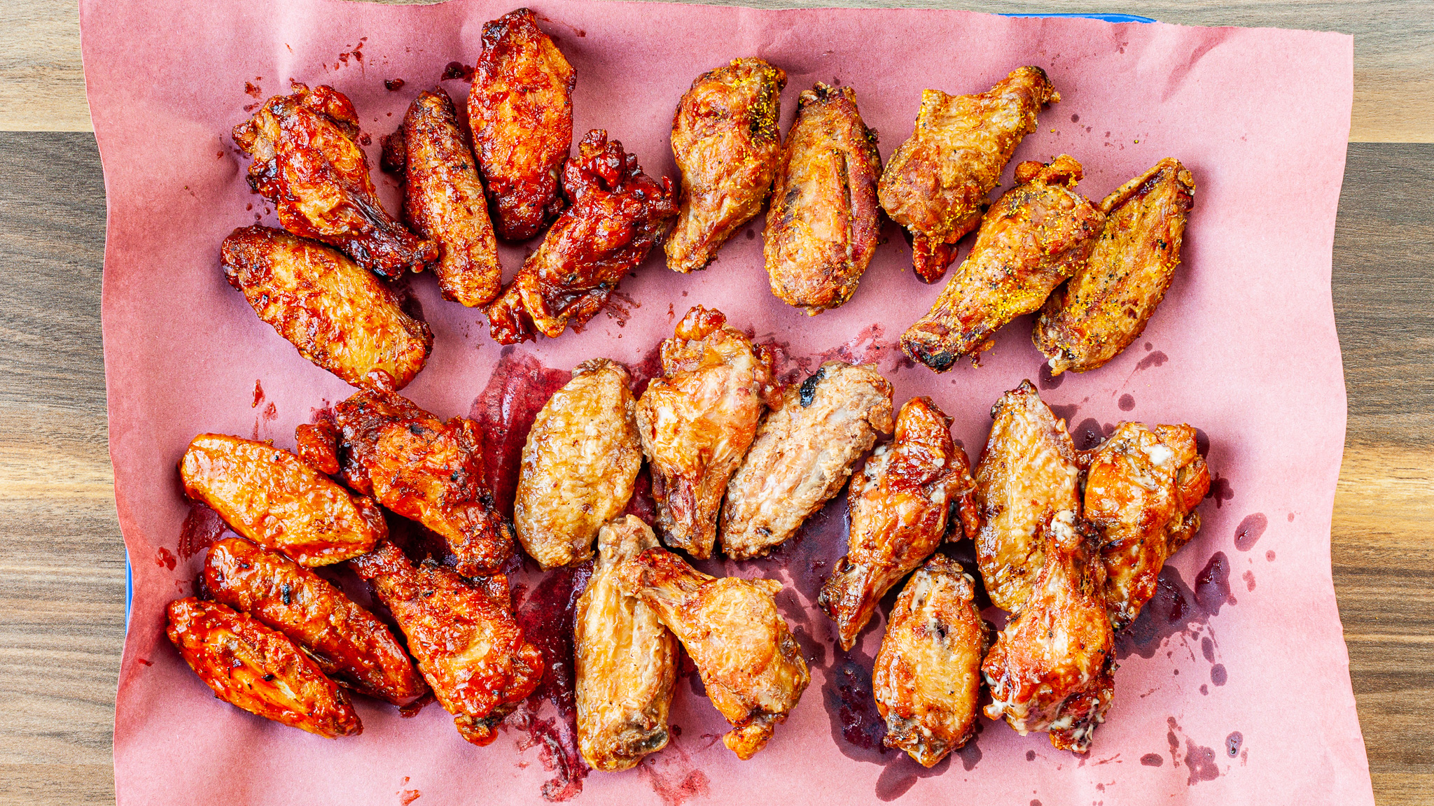 Prairie Dog Brewing's Smoked Chicken Wings - Party size with 25 large, sauced or rubbed Canadian chicken wings, shown on a large BBQ platter.