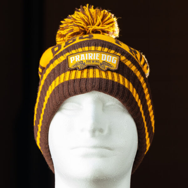 This Prairie Dog® Brewing toque is the perfect addition to any outfit (we think it may even jazz up a suit and tie!. The earth tones are reminiscent of the prairie lands and ingredients used to make the craft beer we all know and love while the slogan gives a nod to your favourite local brewery and lets everyone know what you like.