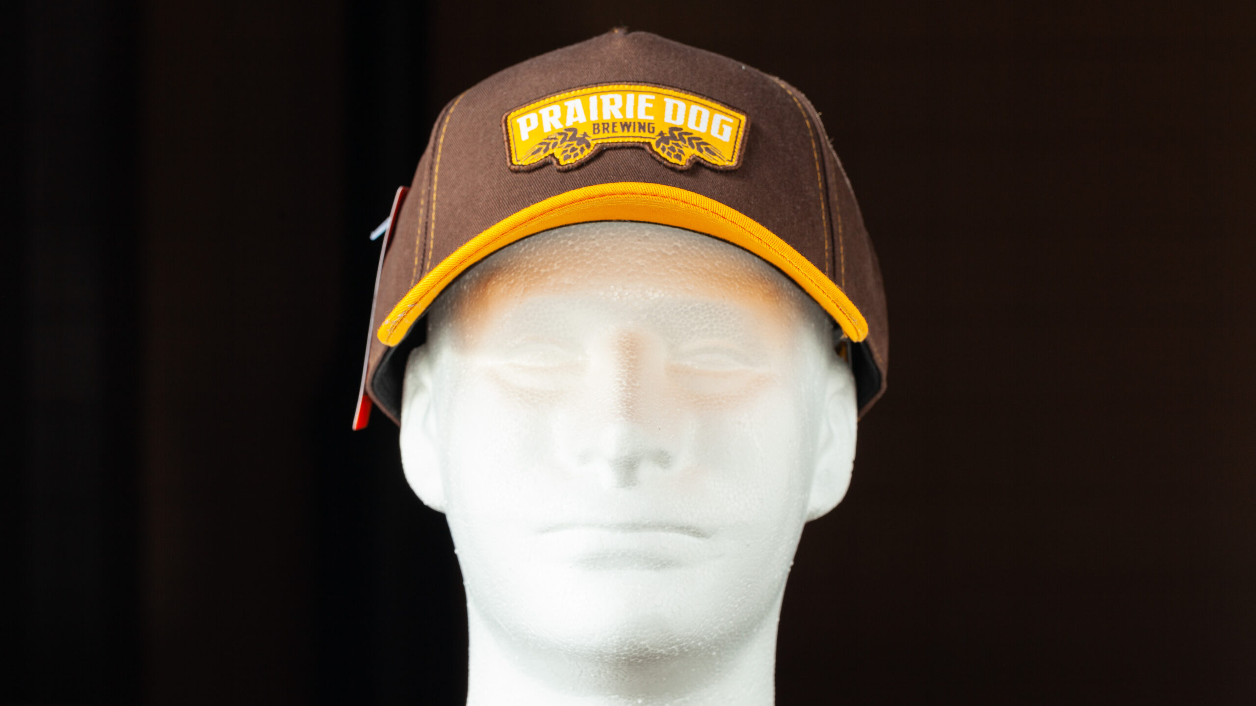 This Prairie Dog® Brewing hat is the perfect addition to any outfit (we think it may even jazz up a suit and tie!. The earth tones are reminiscent of the prairie lands and ingredients used to make the craft beer we all know and love while the slogan gives a nod to your favourite local brewery and lets everyone know what you like.