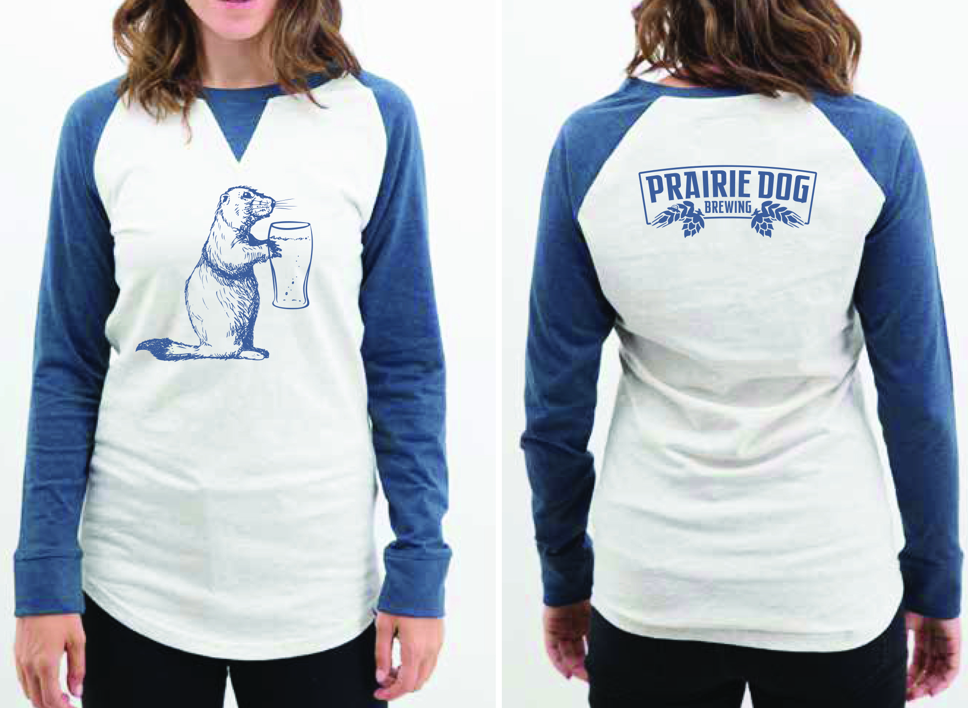 A picture of a woman wearing a navy and white baseball t-shirt with Alby the Prairie Dog on the front and the Prairie Dog Brewing banner on the back.