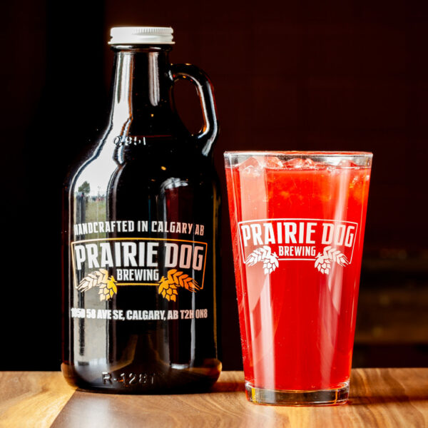 A 946ml howler fill and 473ml draft of Prairie Dog Brewing's Black Cherry Gin Rickey Cocktail.