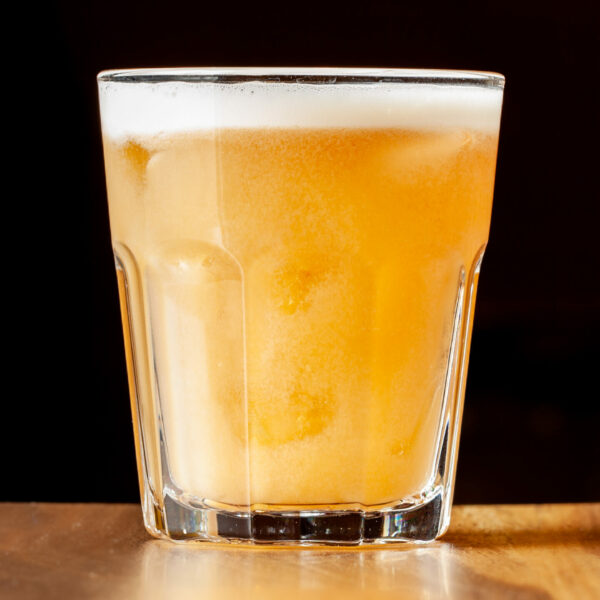 A glass of Prairie Dog Brewing's Whiskey Sour cocktail.