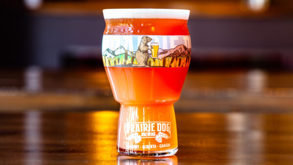Prairie Dog Brewing Berry Manly in 16oz (473mL) branded pint glass.